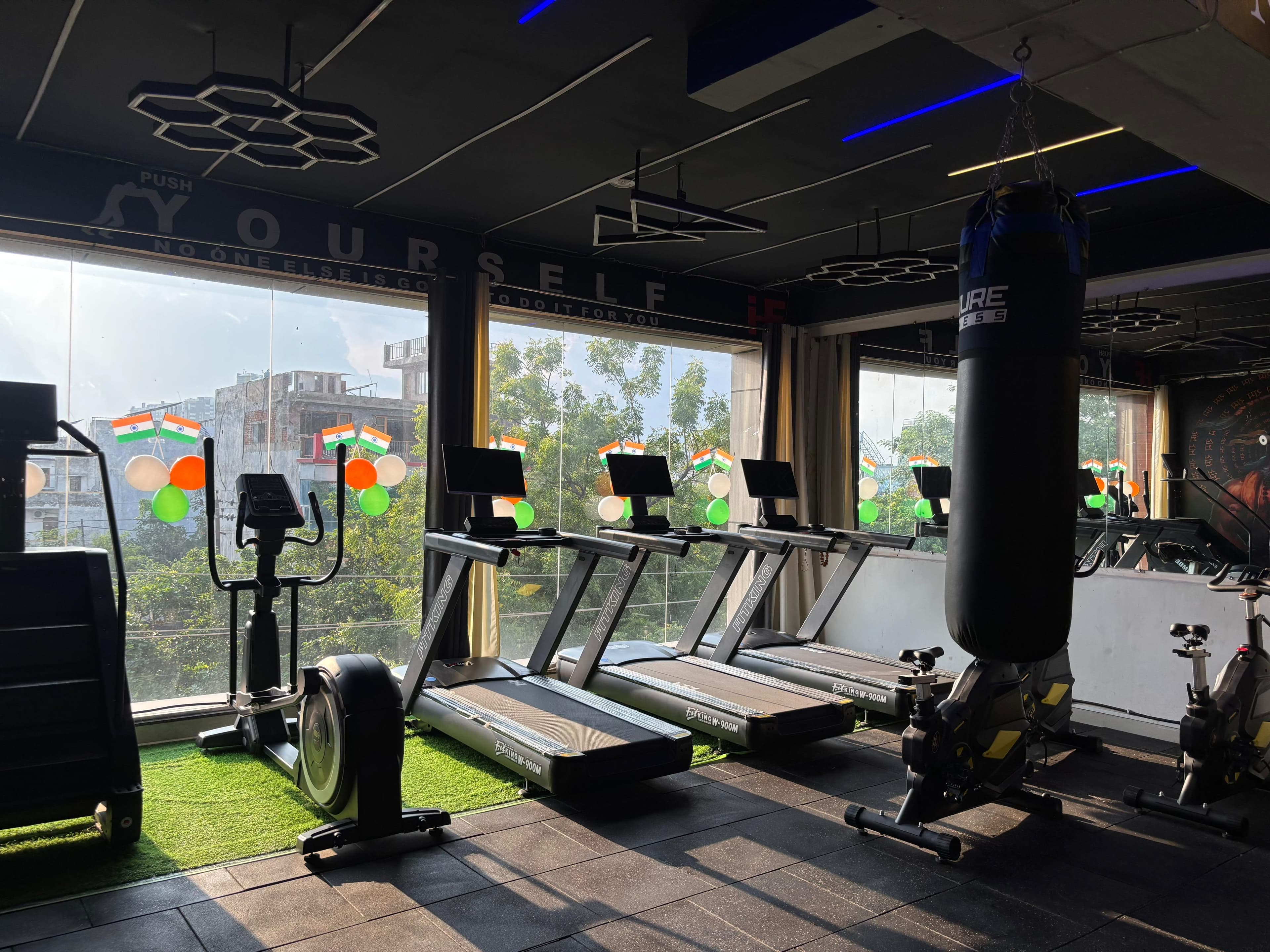 Spacious gym floor with lifting platforms