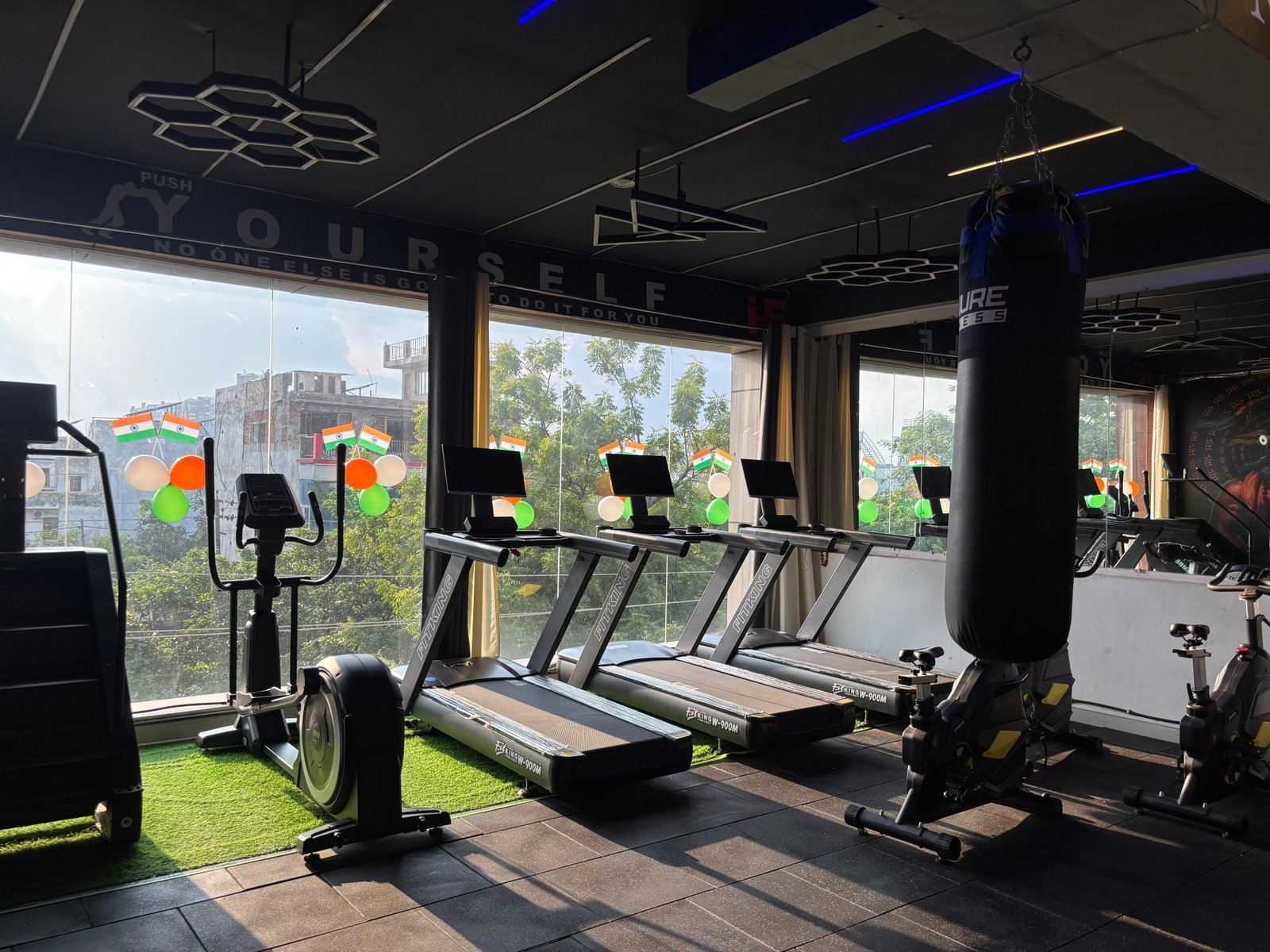Spacious gym floor with lifting platforms